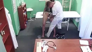 Doctor pulls out sex toy from patients pussy